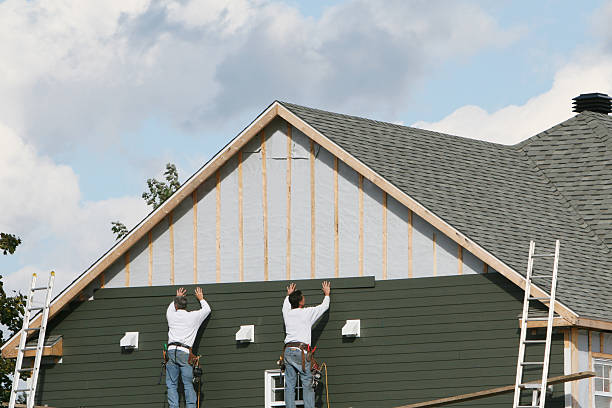 Professional Vinyl Siding technician working in Newtown, PA